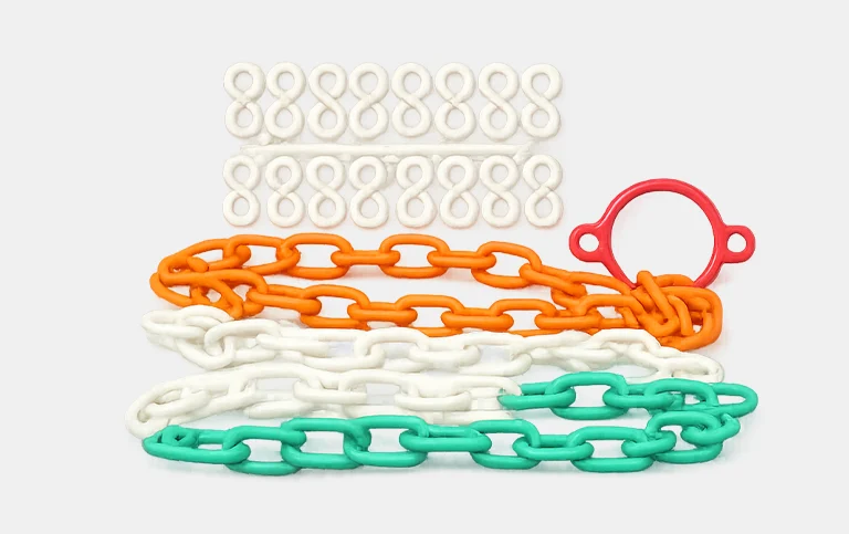Orange, white and green plastic chains with links