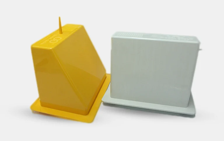 Yellow and grey moulded boxes with base plates
