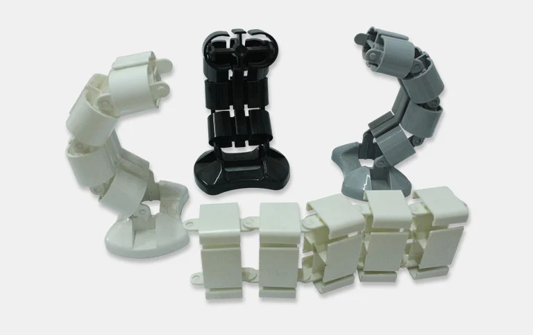 White, black and grey interlocking cable management links
