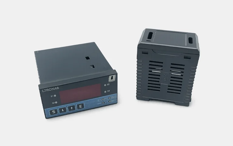 Panel meter housing and vented DIN-rail enclosure