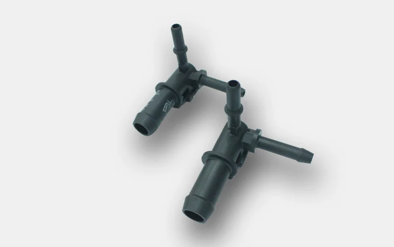 Black multi-port tee manifold