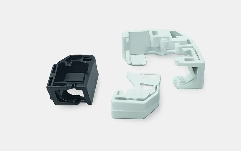 Black and grey pipe holder clips