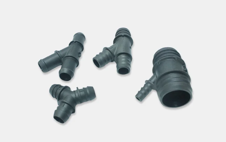 Black Y-connectors, tees and a large reducer