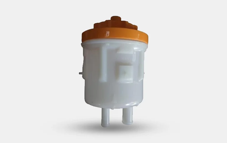 Fluid reservoir with orange cap and hose connections