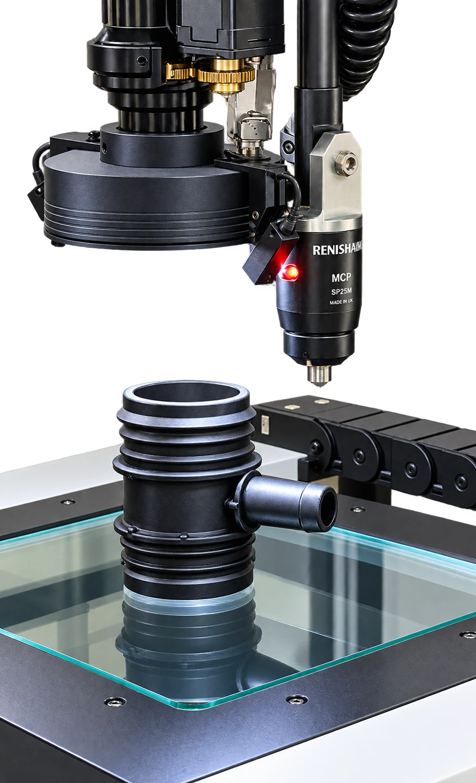 Vision measuring machine with touch probe inspecting a moulded part